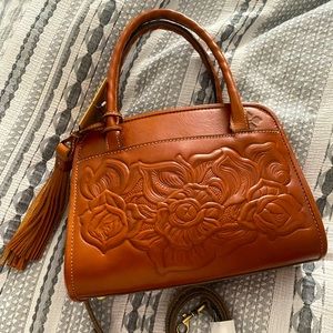 Embossed leather converter bag